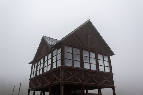 Brown Wooden Framed Glass Windows