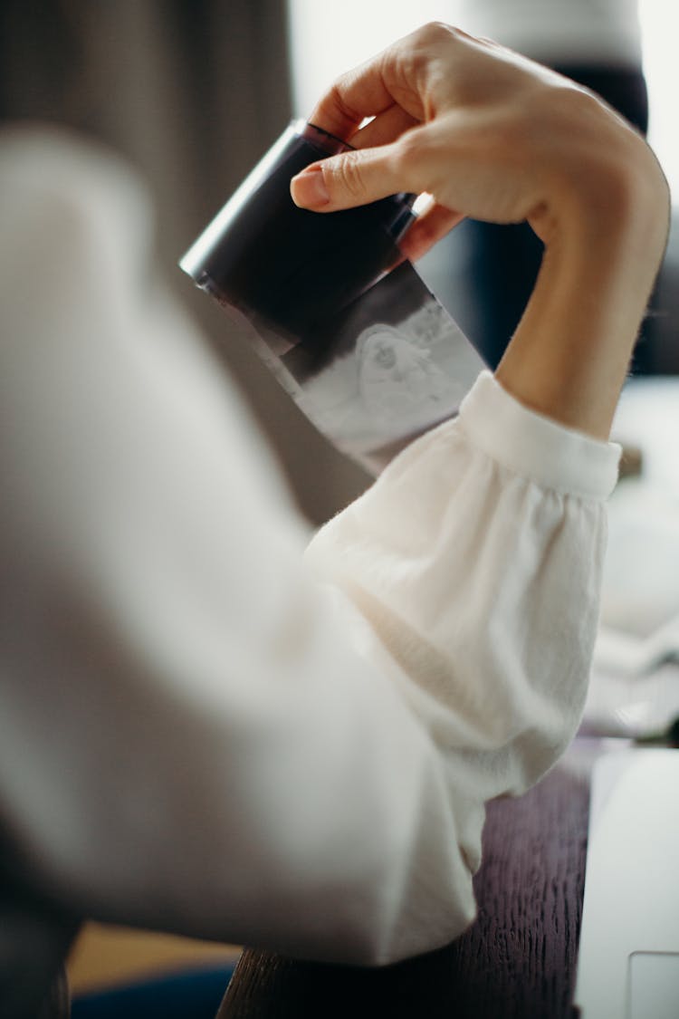 Person Holding Film Strip