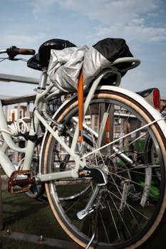 Bicycles parked in an outdoor area on a sunny day in New Taipei City, showcasing urban lifestyle and transportation.