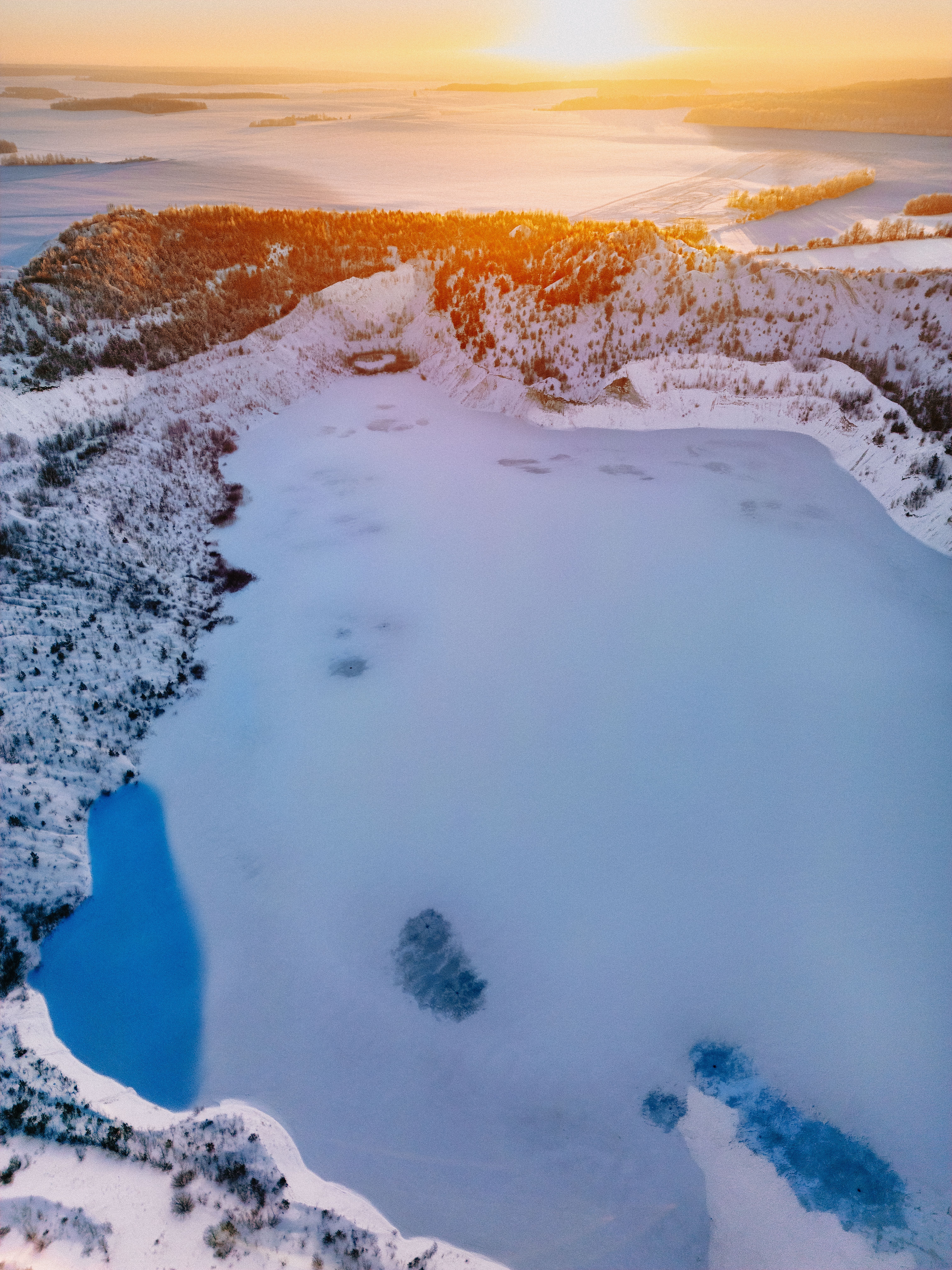Aerial View of Frozen Lake in Winter Sunrise · Free Stock Photo