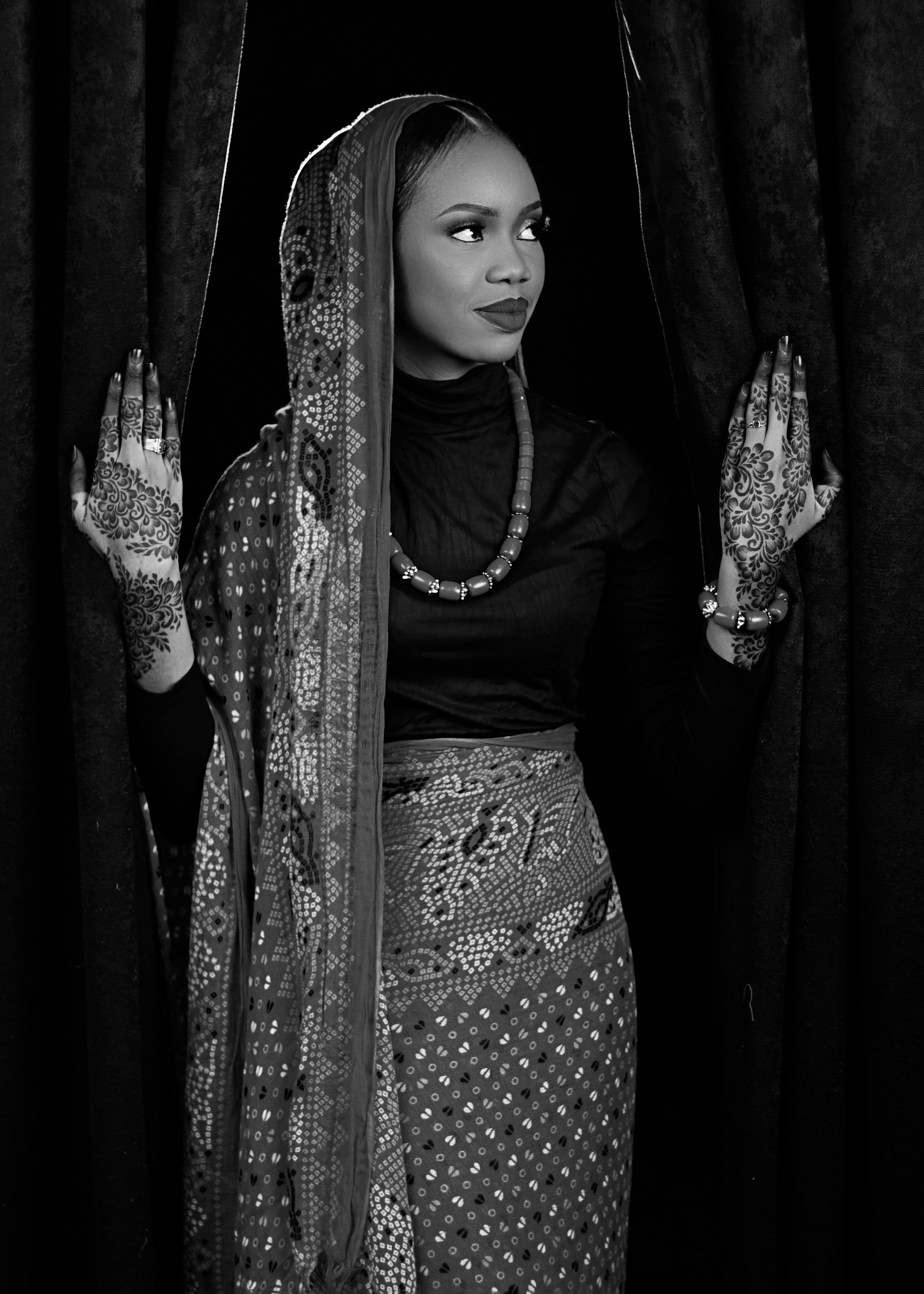 Elegant Black and White Portrait in Traditional Attire · Free Stock Photo