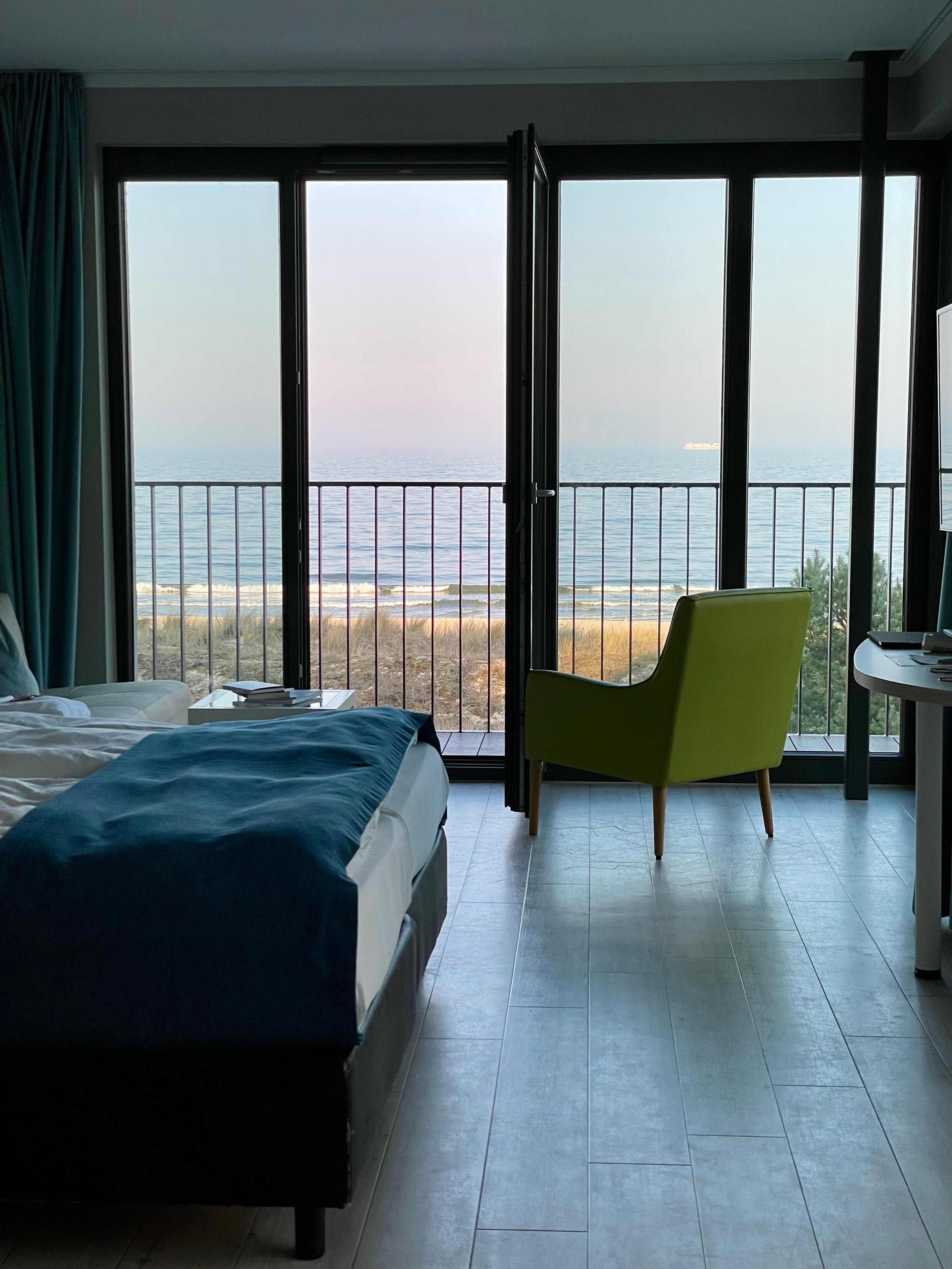 Bright contemporary Baltic coastal hotel room overlooking the sea