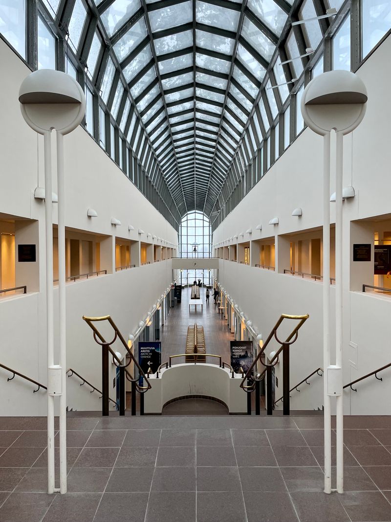 Modern glass atrium interior of the Arktikum museum in Rovaniemi, Finland