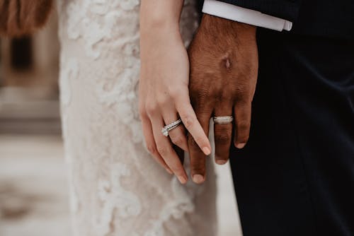 Free Two Persons Wearing Silver-colored Rings Stock Photo