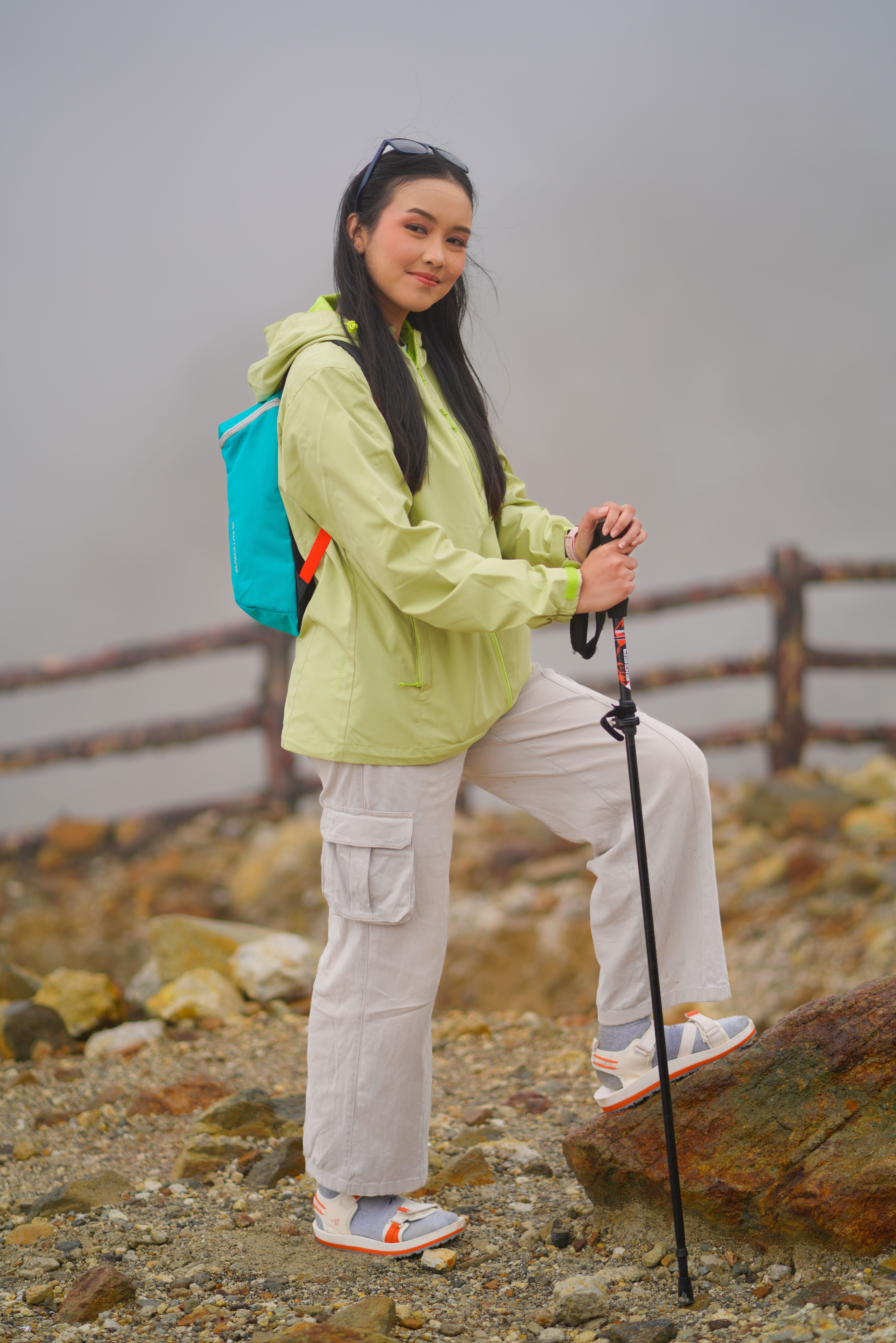 Young Woman Hiking in Misty West Java Landscape · Free Stock Photo