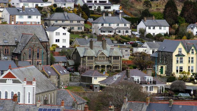 Traditional Welsh village architecture with terraced houses, illustrating the residential property purchases that attract Welsh LTT higher rates
