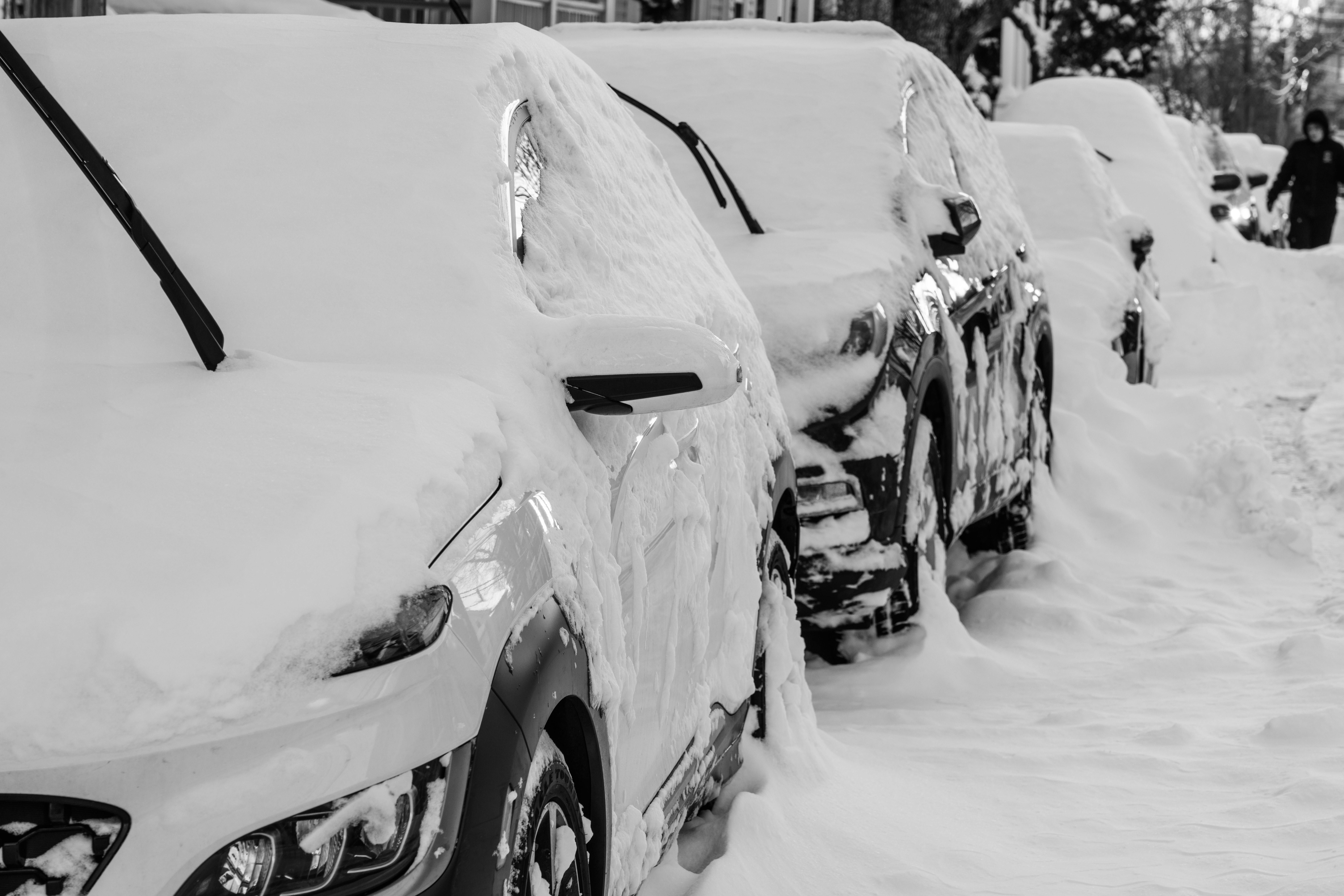 outdoor condenser unit buried in snow - Post Snowstorm HVAC tips