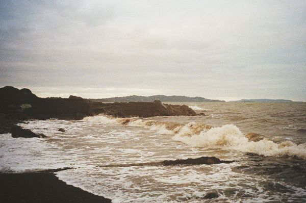 Sea waves on the rocky coast of Bray, County Wicklow
