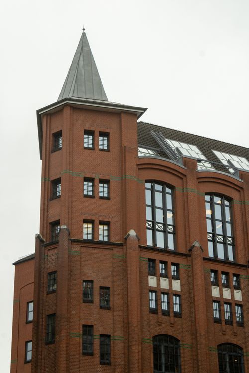 Free Explore the gothic-style red brick architecture of a Hamburg landmark. Stock Photo