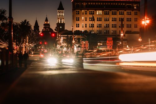 Free Vibrant long exposure photo of St. Augustine, Florida at night, showcasing traffic lights and historic architecture. Stock Photo