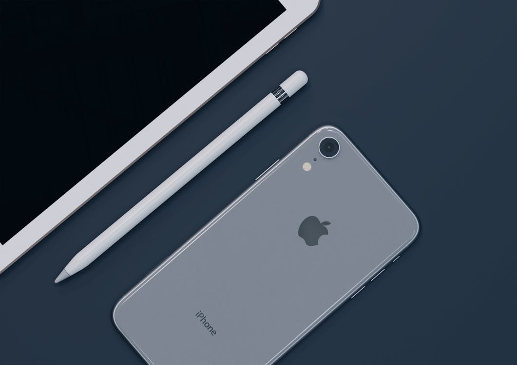 White Iphone Xr demonstrating Apple's brand identity
