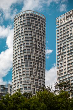 Tall modern skyscrapers against a clear blue sky in the vibrant Mexico City.
