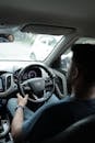 Man Driving a Car with Interior View