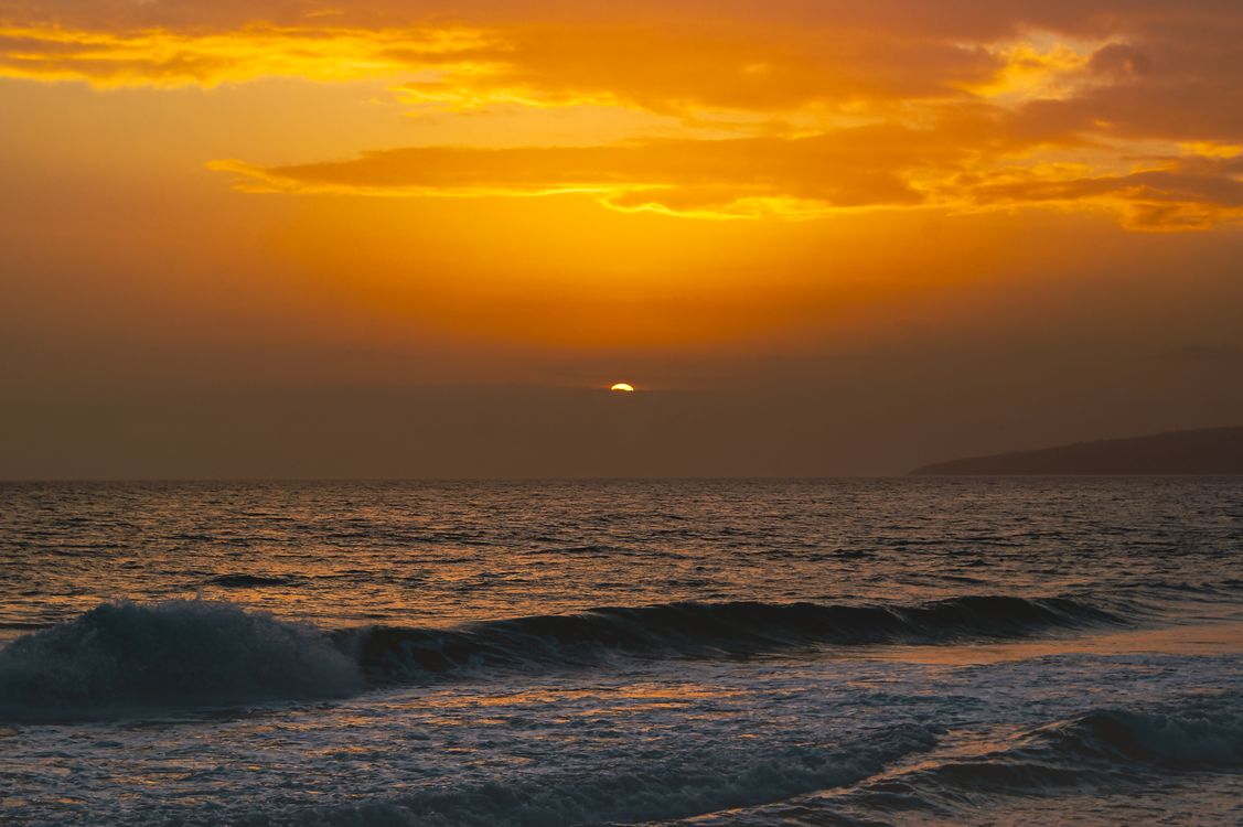 Stunning Ocean Sunset with Vibrant Sky · Free Stock Photo