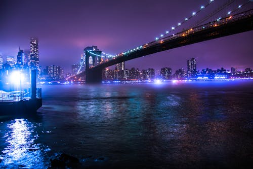 Free Bridge over Water during Night Time Stock Photo