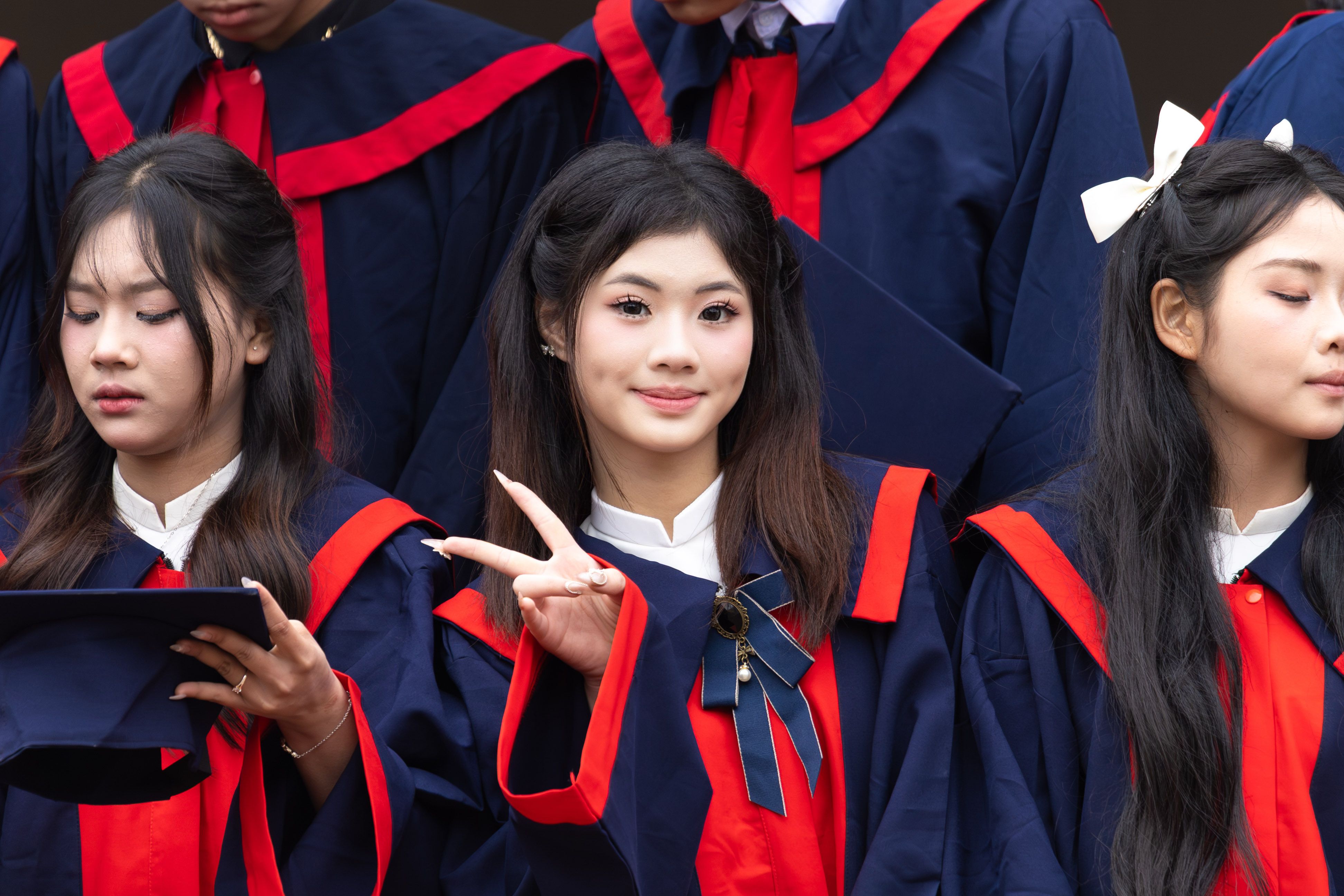 Graduates celebrate their achievements in a vibrant ceremony in Hanoi, Vietnam.