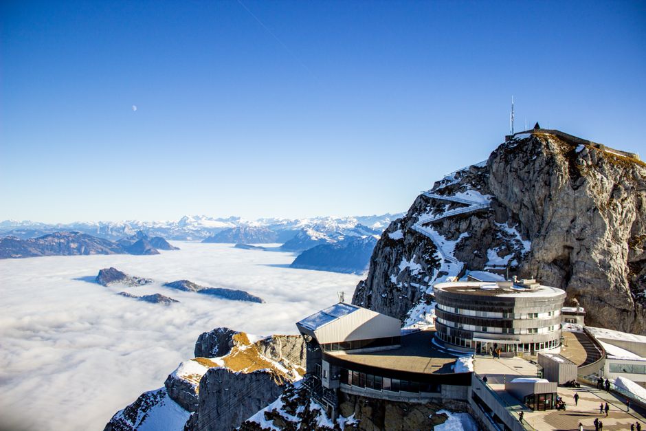 Panoramic view of Mount Pilatus and surrounding Alps in Switzerland, covered in snow.
