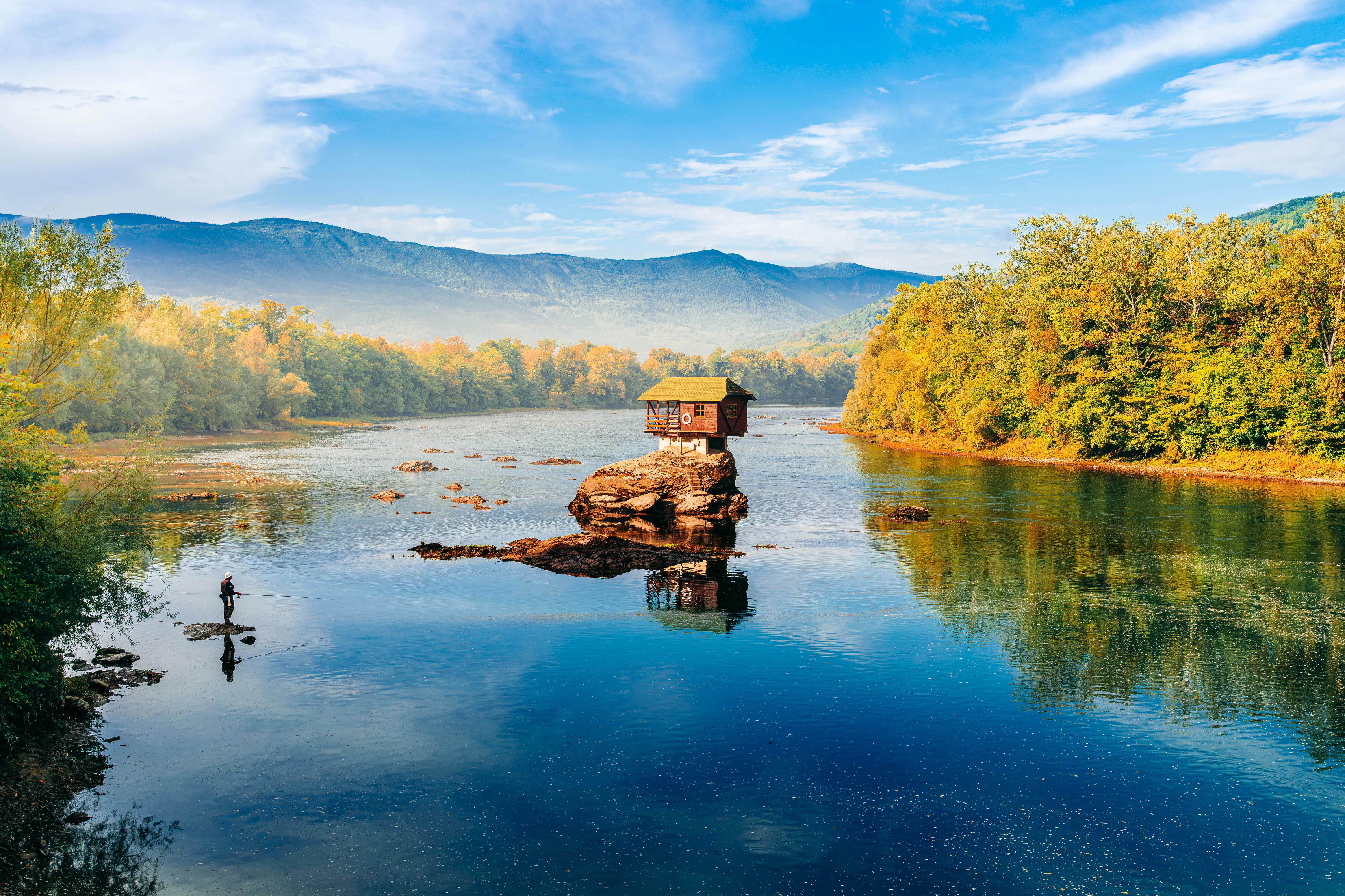 Scenic view of a small house perched on a rock in the Drina River, Mokra Gora, Serbia.