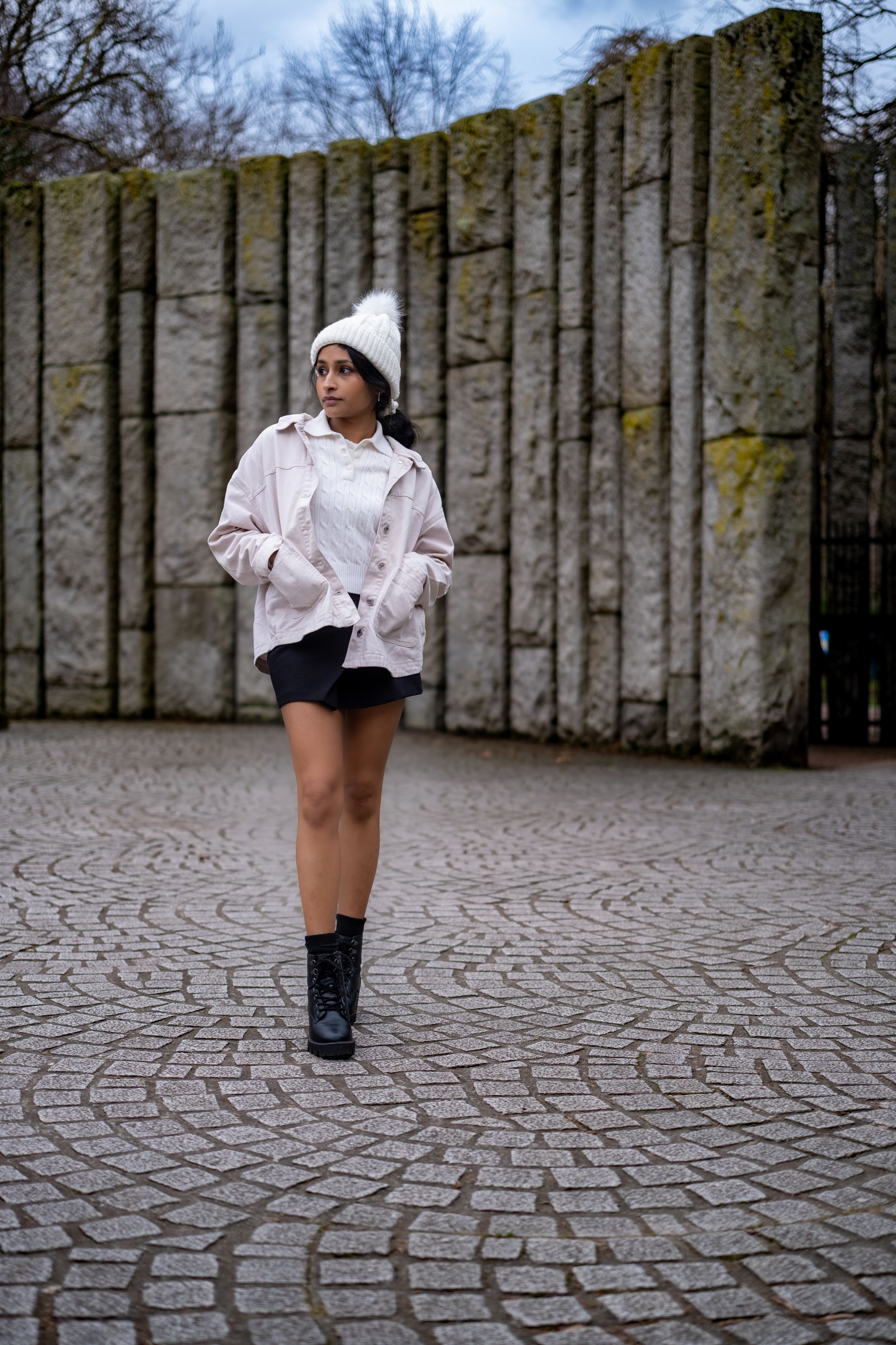 Stylish Woman Walking in Urban Dublin Setting · Free Stock Photo