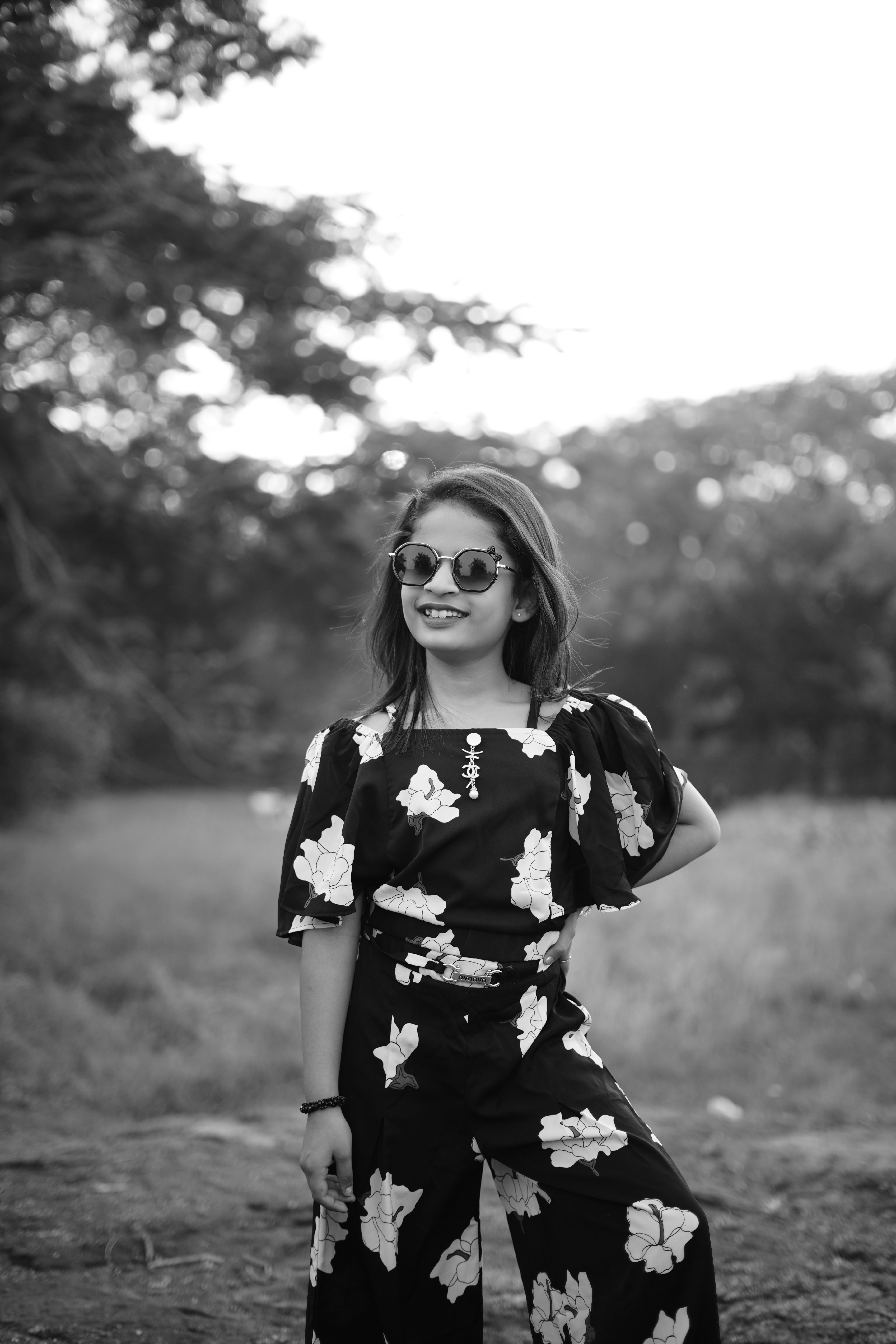 Black and White Portrait of Woman in Floral Dress · Free Stock Photo