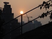 Sunset Behind Hong Kong Urban Skyline Silhouette