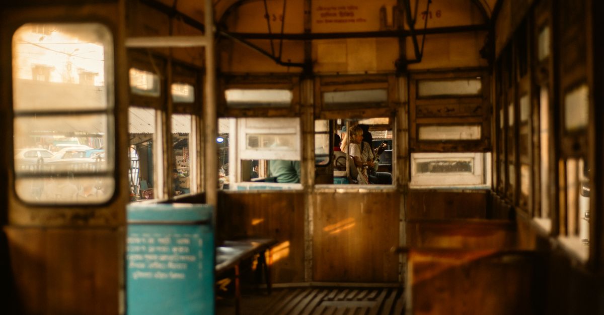 Vintage Tram Interior in Soft Golden Light · Free Stock Photo