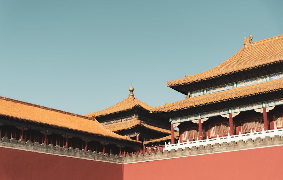 Red And Brown Temple Under Blue Sky · Free Stock Photo