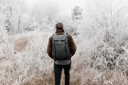 Free A person hiking through a frosty winter landscape in Budapest, Hungary. Stock Photo