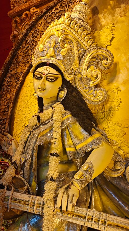 Free Detailed image of Goddess Saraswati's sculpture adorned with intricate decorations. Stock Photo