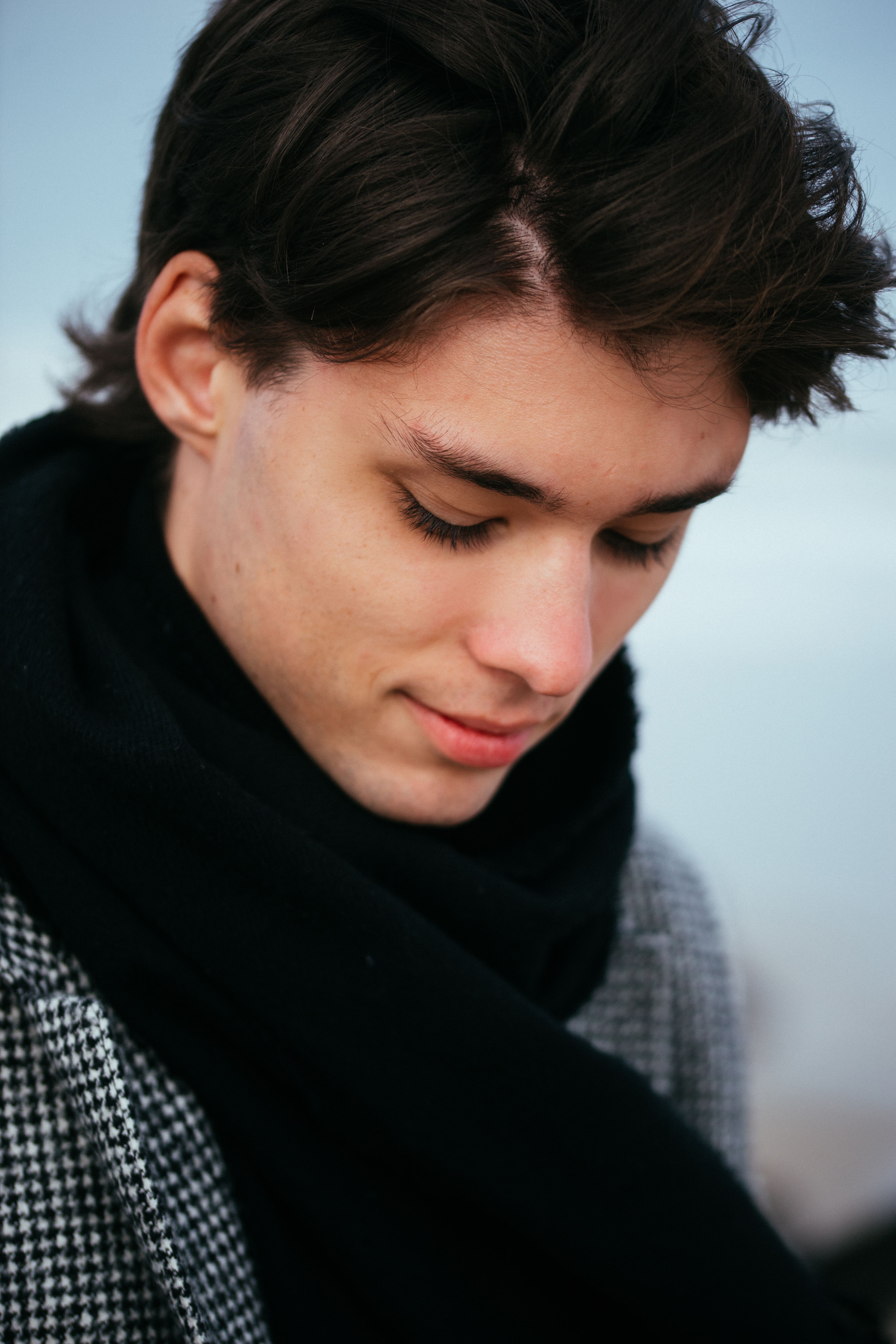 Stylish Young Man in a Winter Scarf Portrait · Free Stock Photo