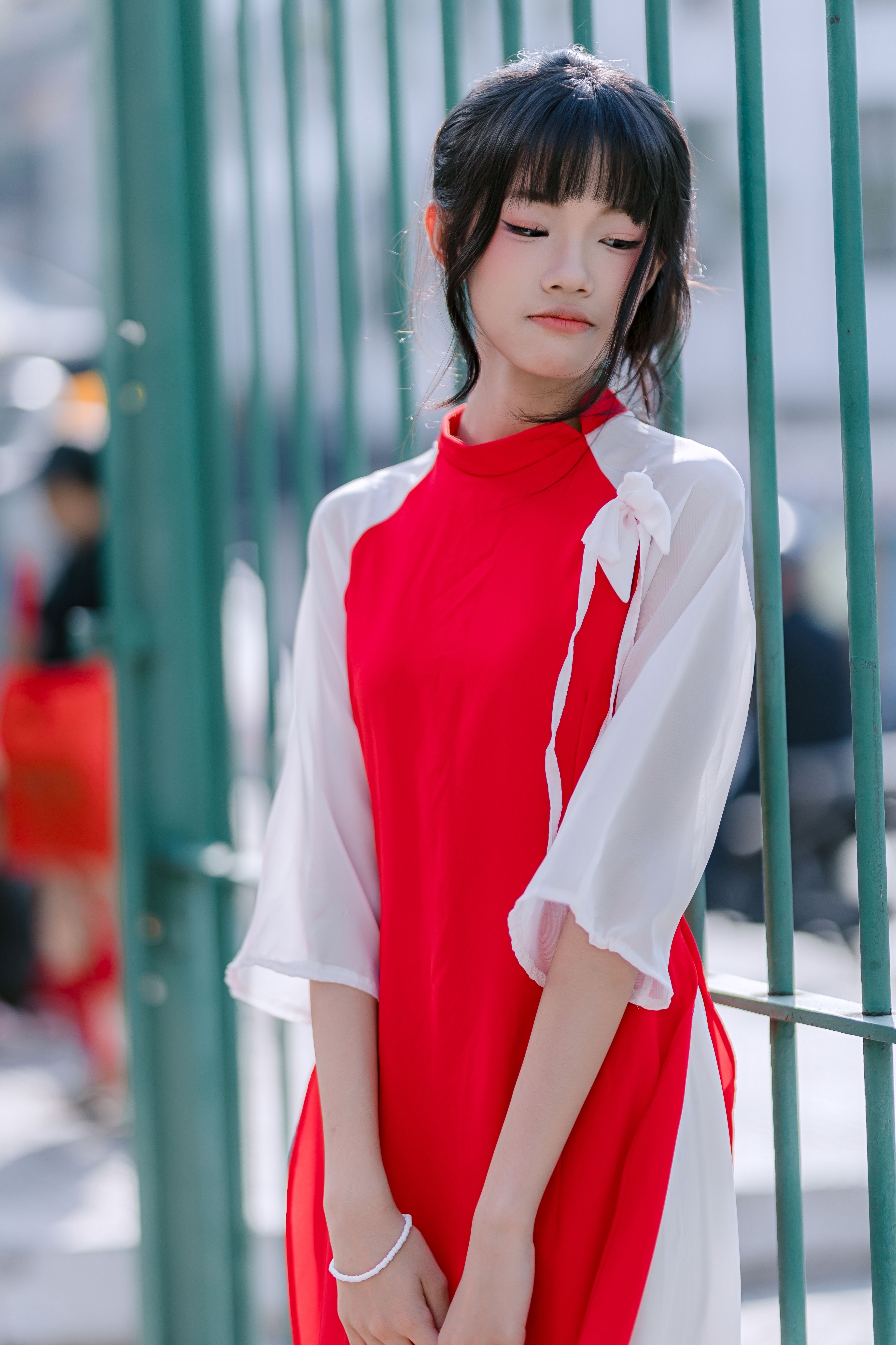 Elegant Young Woman in Traditional Red Dress  Free Stock Photo