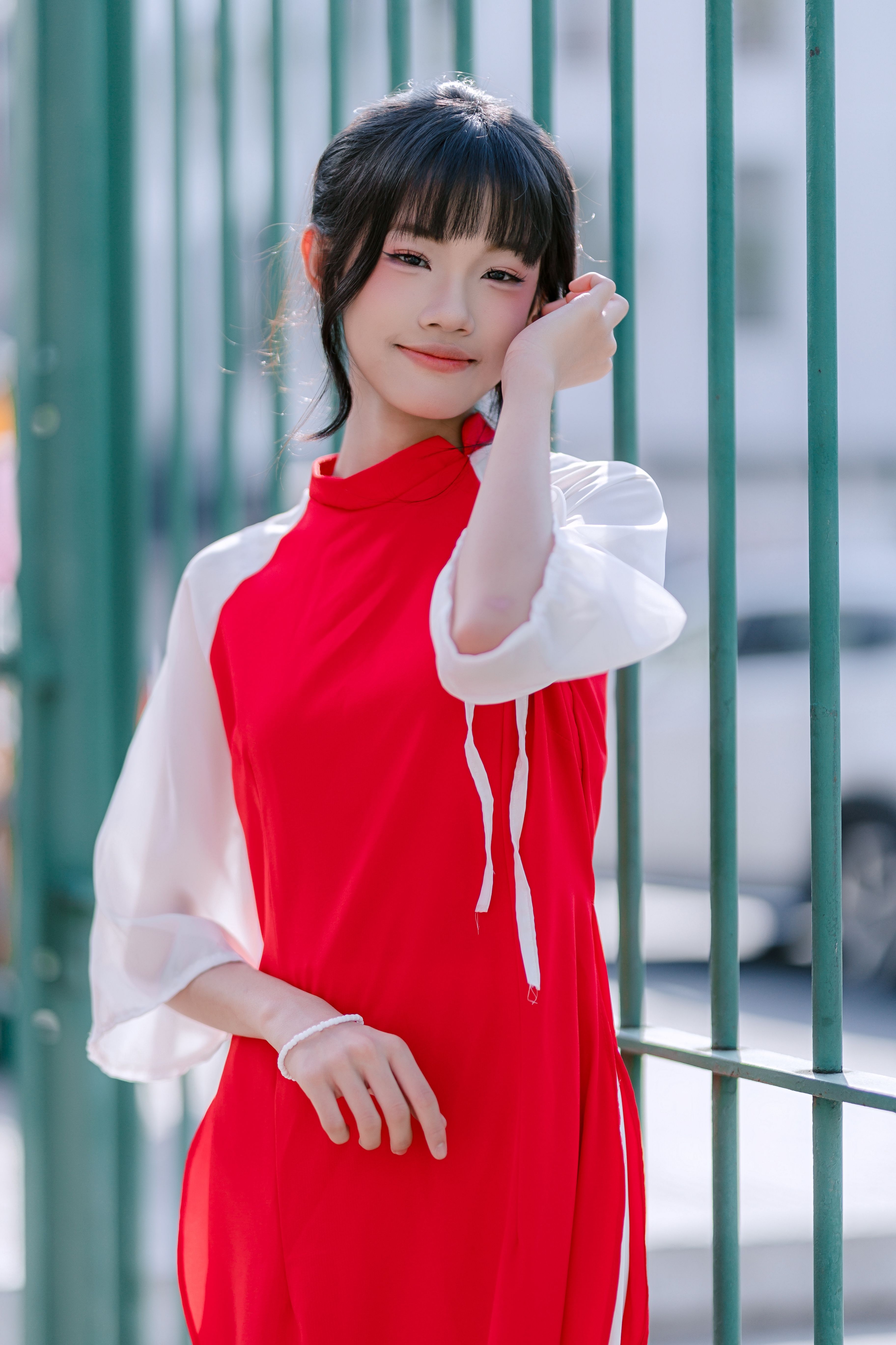 Portrait of a Woman in a Red Dress Outdoors · Free Stock Photo