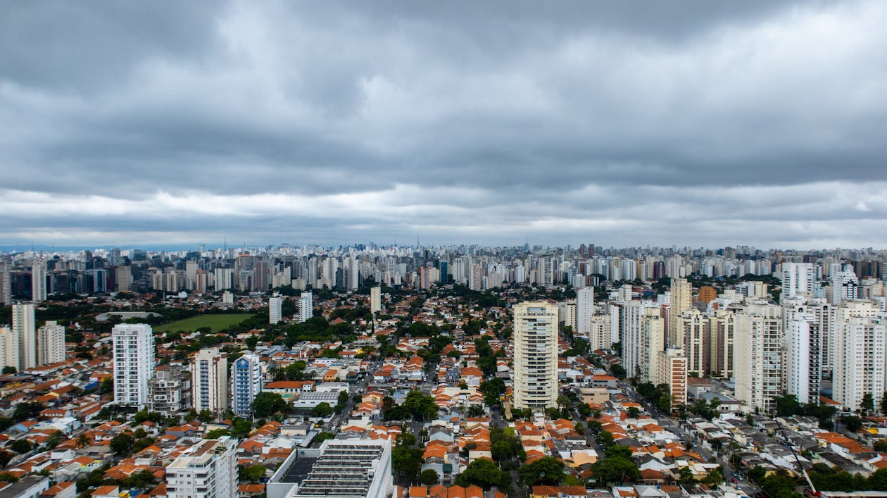 Bird's Eye View Of City Under Cloudy Sky