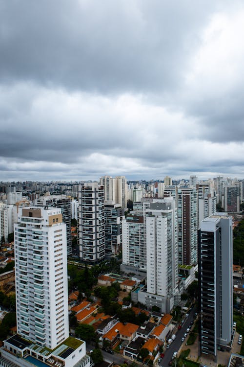 Free Scenic View Photo of City Under Cloudy Sky Stock Photo