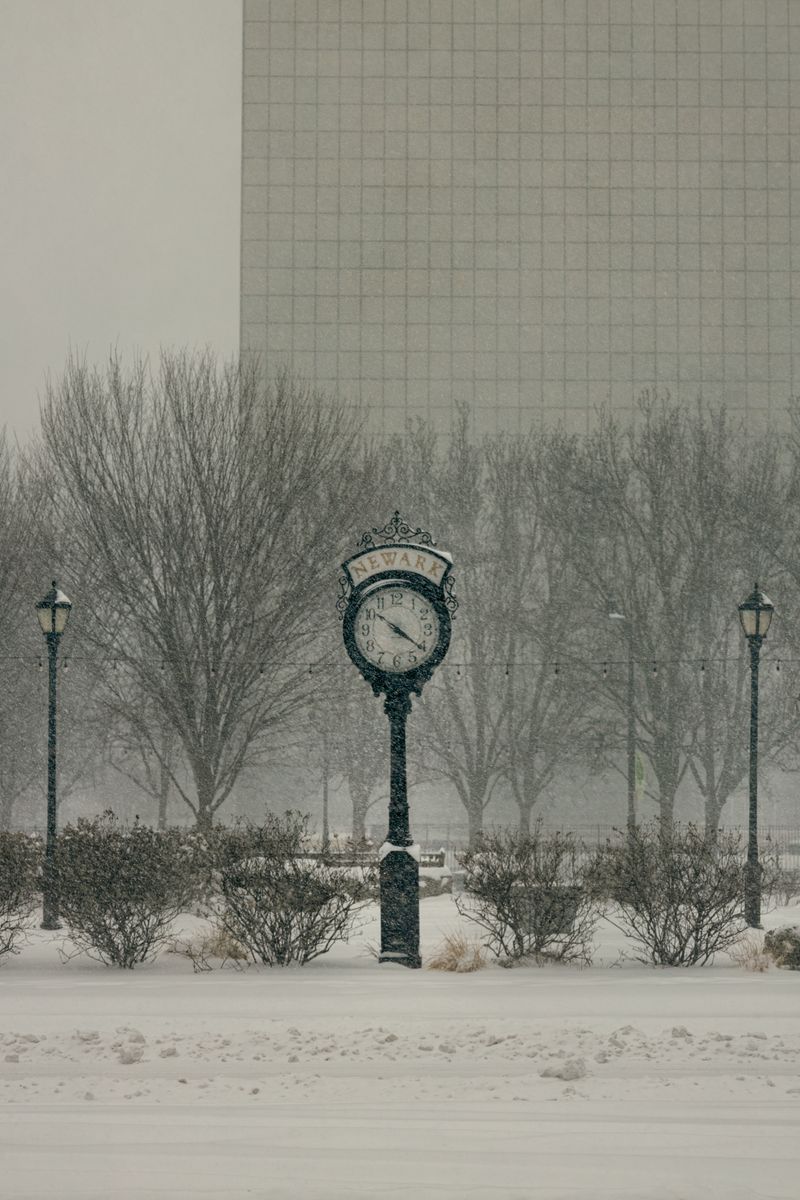 Vintage street clock on a snowy Newark, New Jersey street