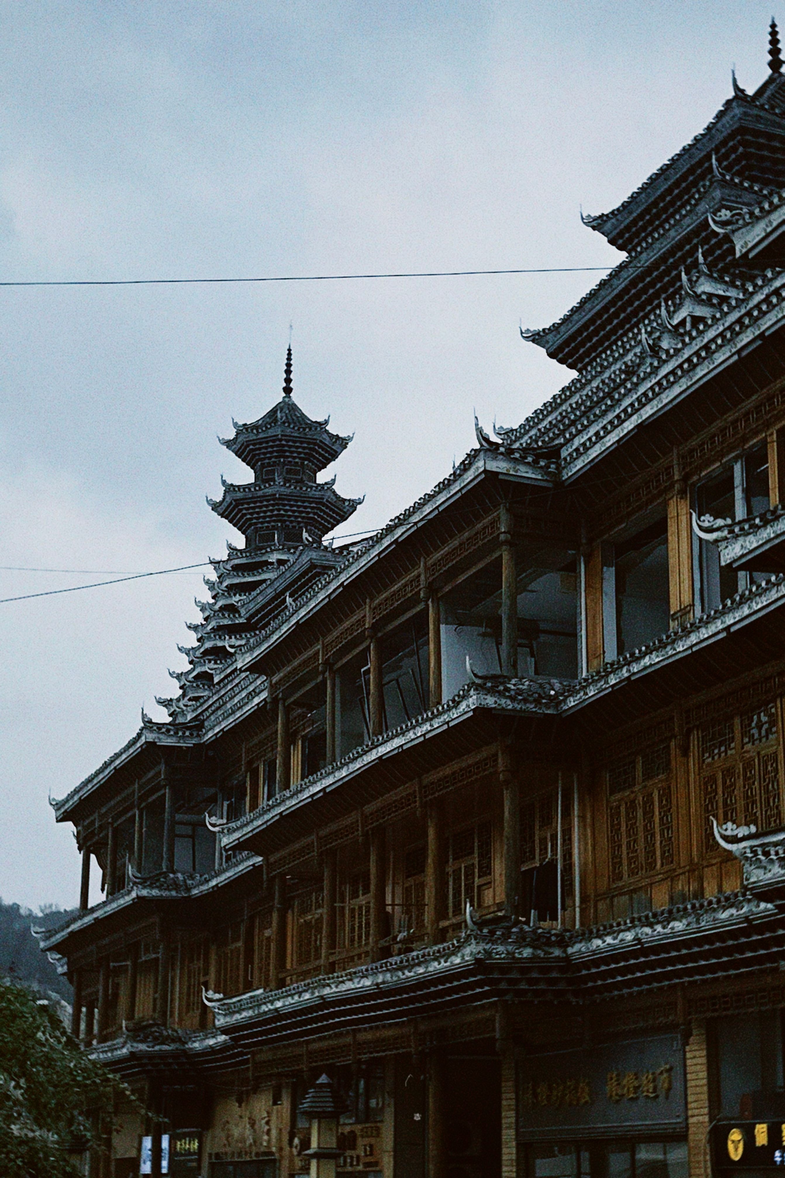 Explore the intricate details of traditional Chinese architecture in Guizhou Province, China.