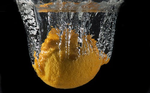 Water Splash on Yellow Round Lemon