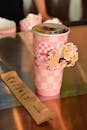 Katinat Coffee Cup with Pink Checkered Design