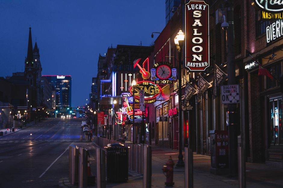 Explore neon-lit Nashville's Broadway street, a hub for nightlife and iconic bars.