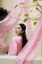 Elegant Woman in Traditional Pink Attire