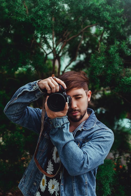 Photo Of Man Holding Camera