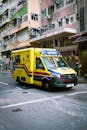 Bright Ambulance on Busy Urban Street