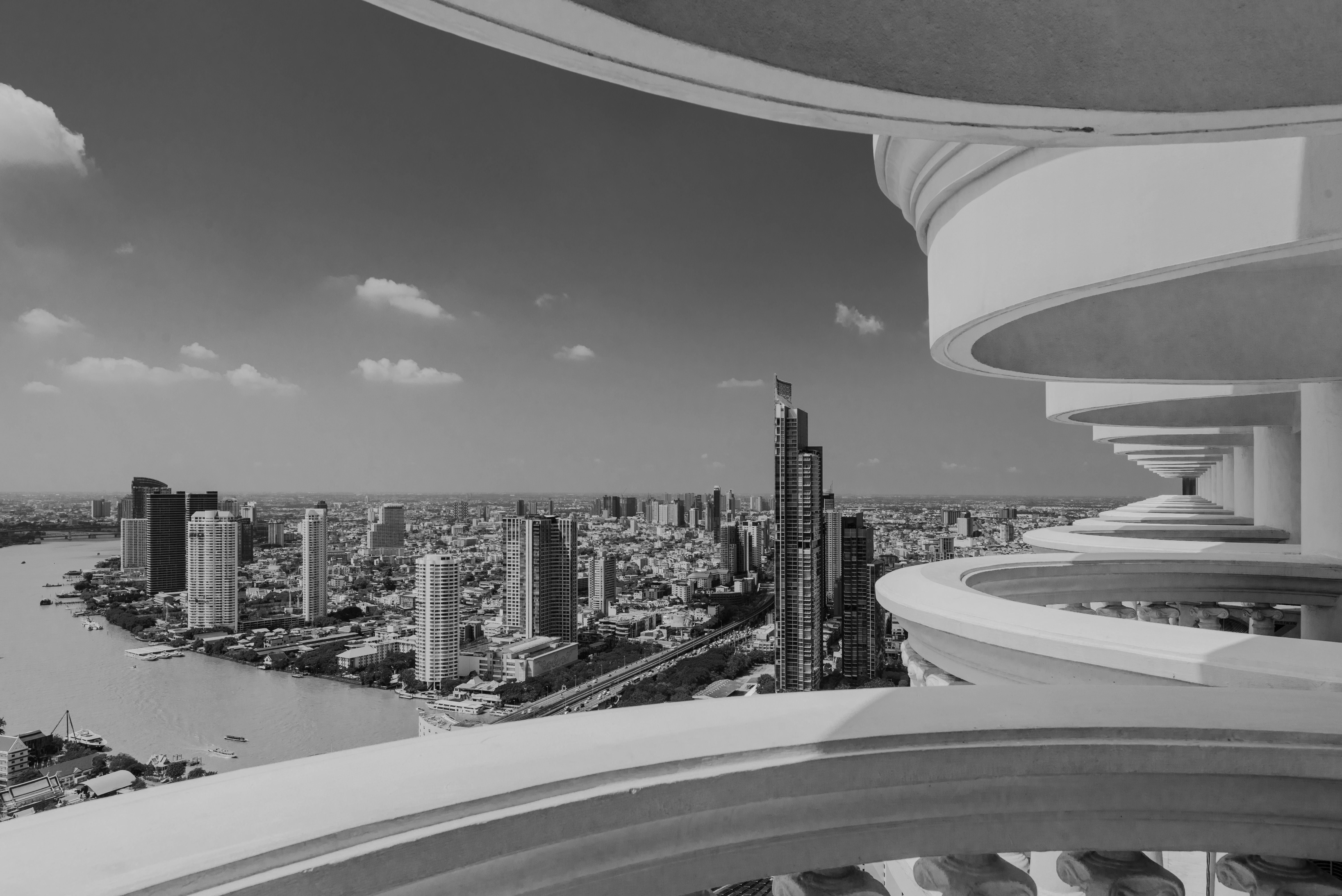 Striking view of a Thai city skyline with modern buildings, evocative of Ubon Ratchathani's banking district.