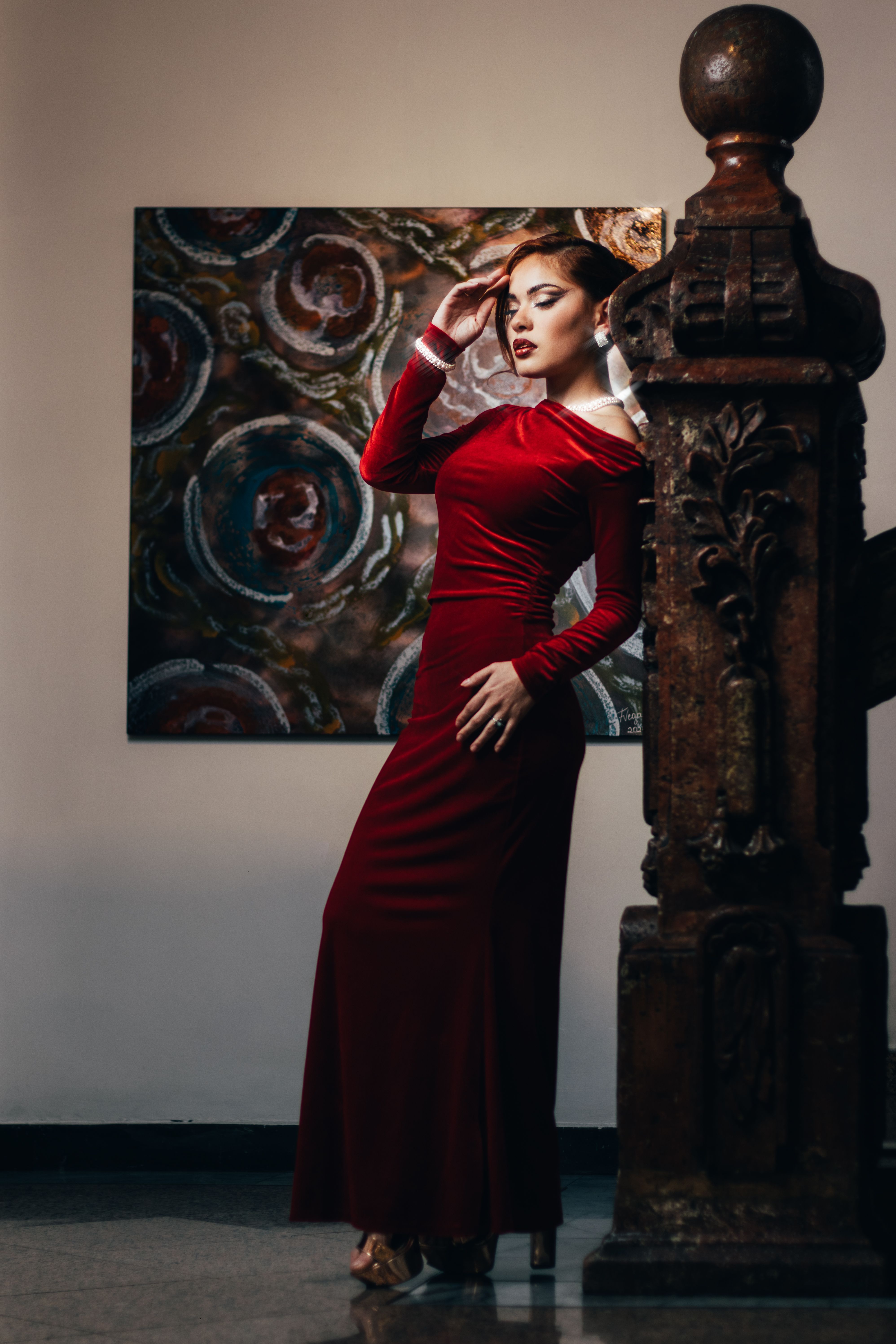 Elegant Woman Posing in Red Dress Indoors · Free Stock Photo