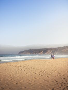 A serene morning beach walk in Cascais, Portugal, capturing the beauty of Guincho Beach.