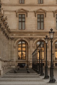 A classic view of the Louvre Museum in Paris showcasing its historic architecture and iconic design.