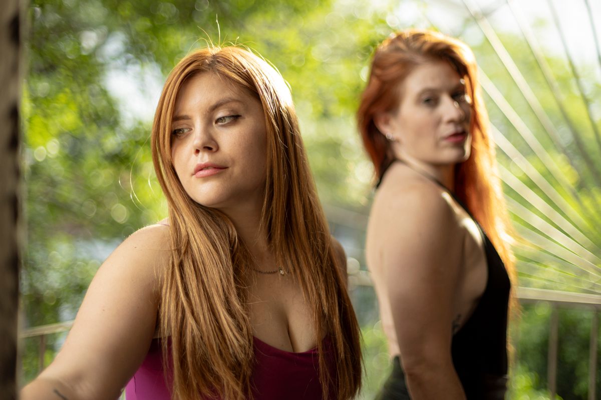 Portrait of Two Women with Red Hair Outdoors · Free Stock Photo