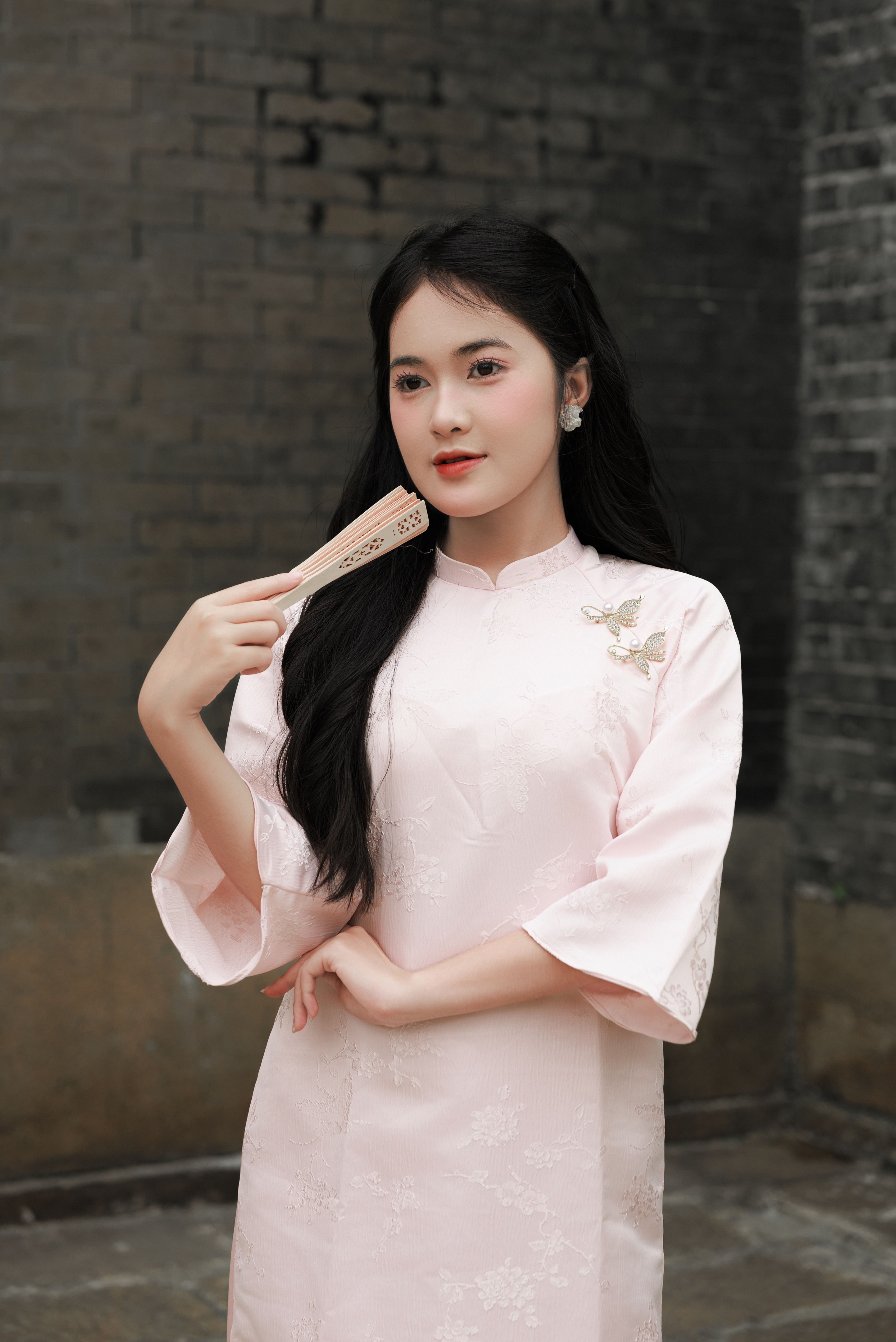 Elegant Asian Woman in Traditional Dress  Free Stock Photo