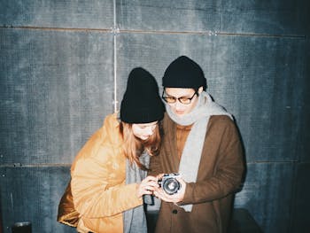 Man and Woman Looking at Camera