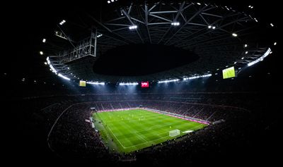 Aerial view of a floodlit ground during a night match — photo by ShotsBy Csongii on Pexels